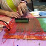 close up of hand workman on art project